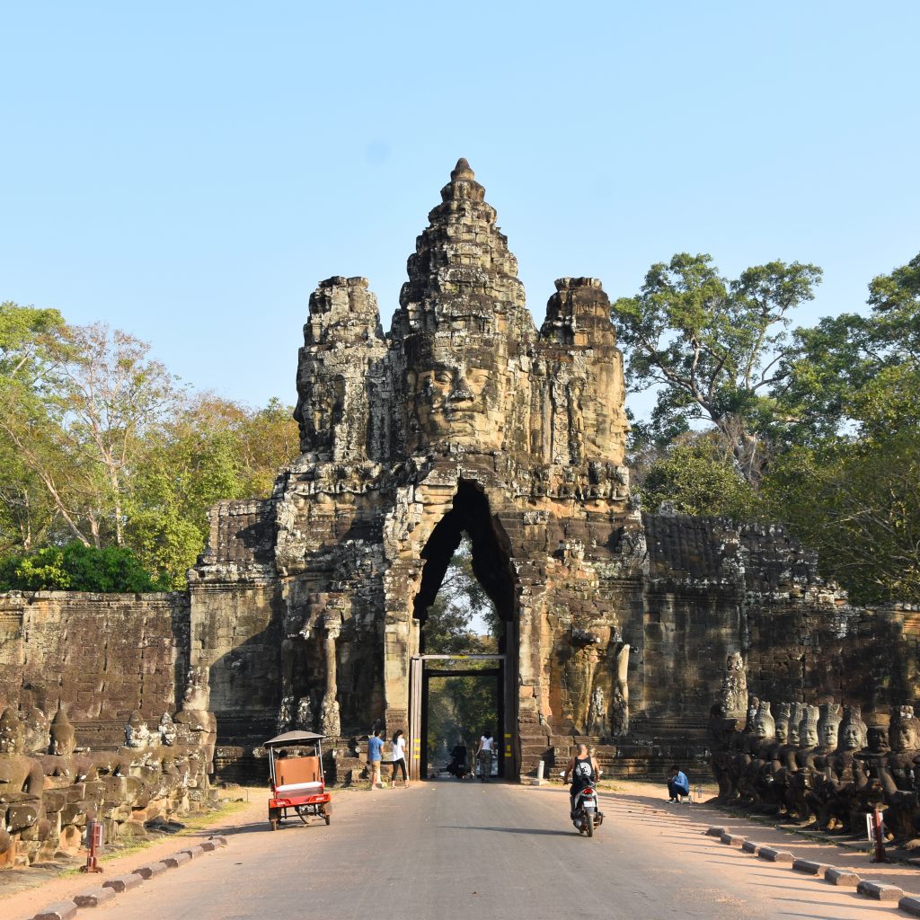 Angkor Thom South Gate and its face towers in the center. Angkor Thom South Gate and its face towers in the center.