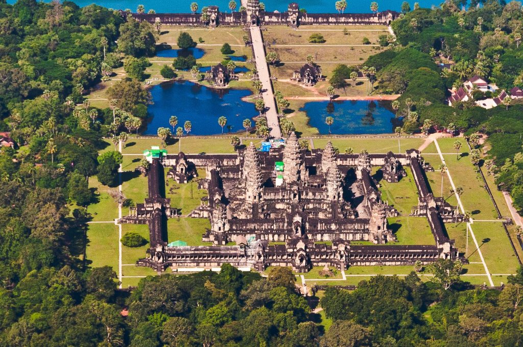 A panoramic view of Angkor Wat, the largest and most famous temple complex in Cambodia Angkor Wat, the masterpiece of Khmer architecture, a Hindu-Buddhist temple built in the 12th century by King Suryavarman II.